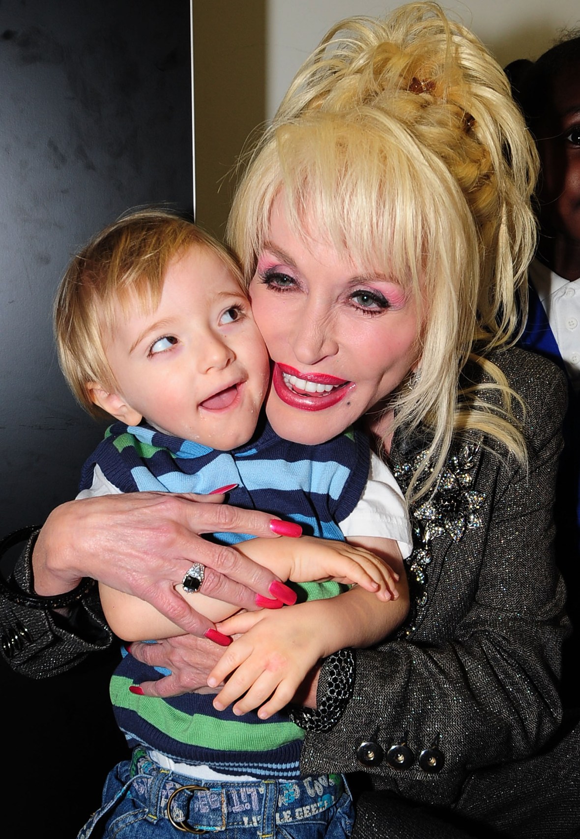 Dolly Parton Devotes Her Time to Help Children Discover ...