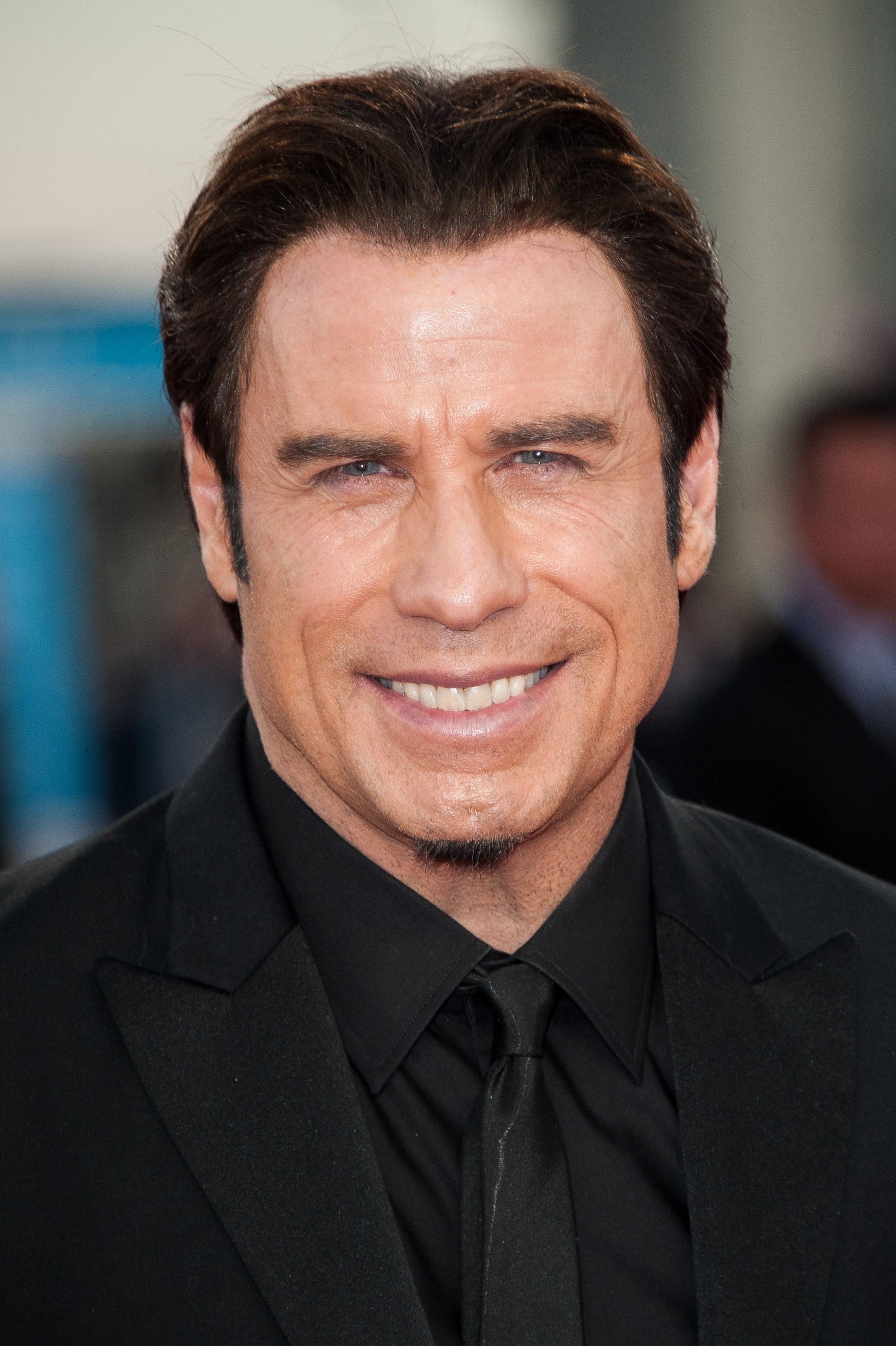 John Travolta transforms for the New Year See the stars bold and bald  look