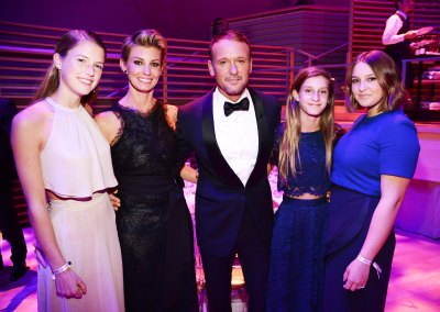 faith, tim and their daughters in april 2015. (photo credit: getty images)