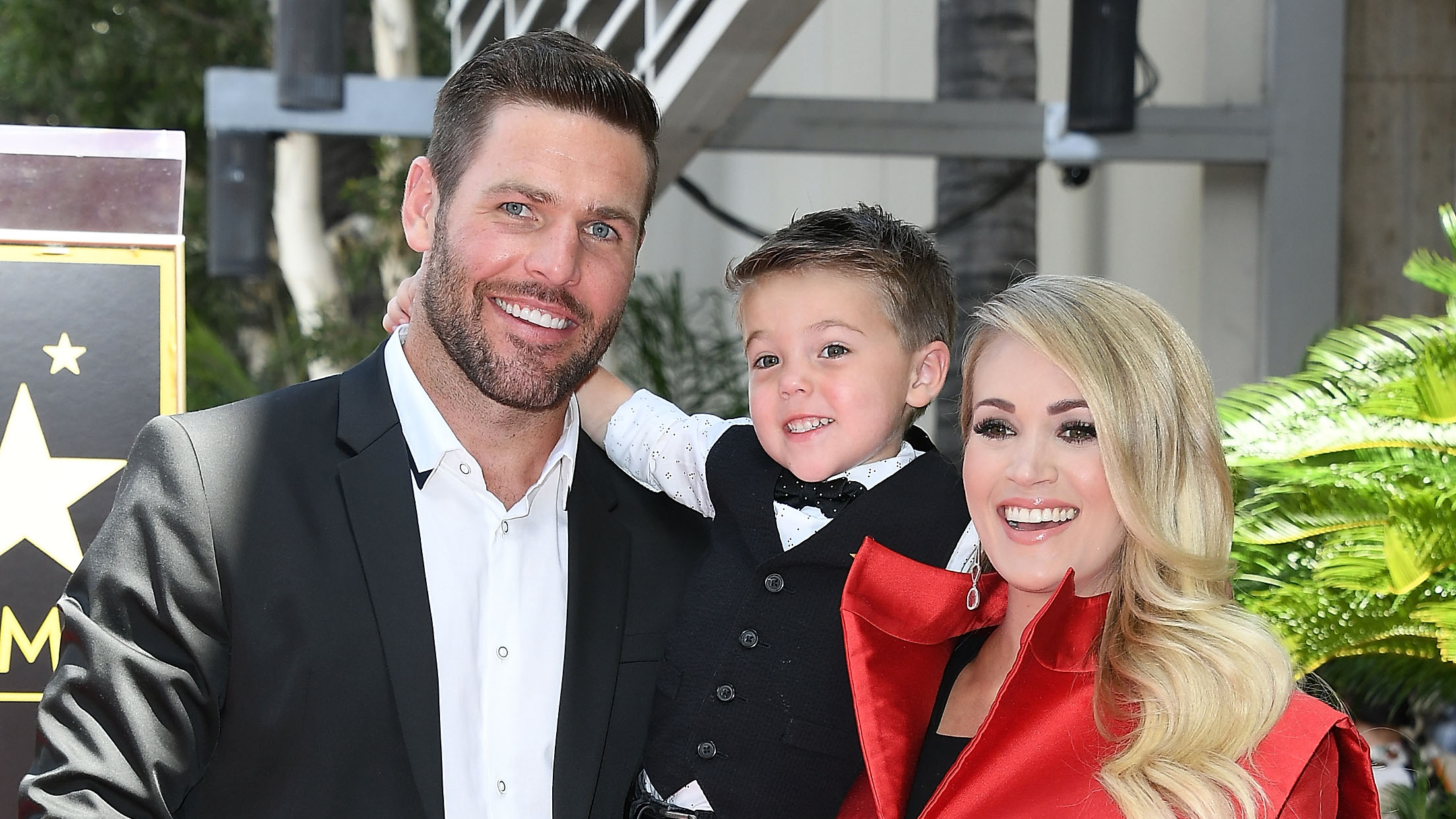 Carrie Underwood's Husband Mike Fisher and Son Isaiah Drop Puck at
