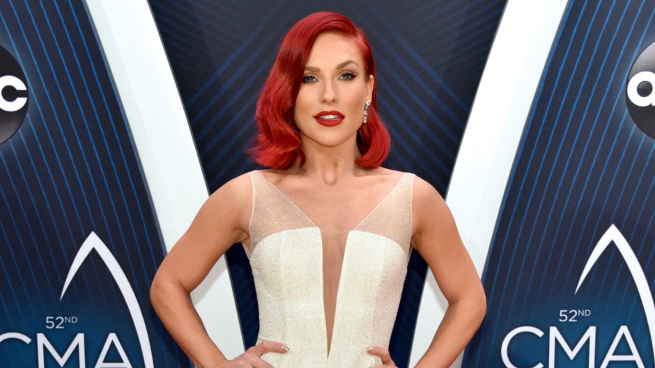 sharna-burgess-white-gown-cma-awards-arrival