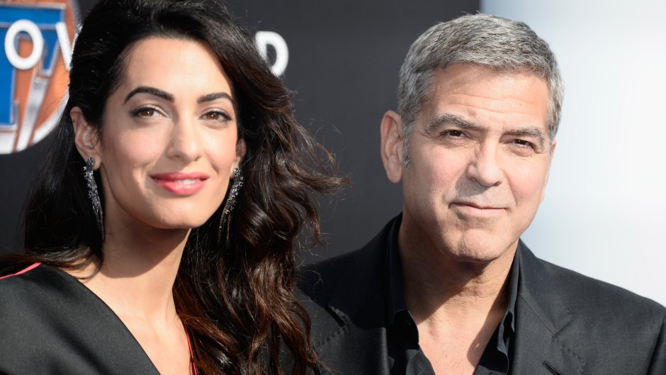 amal Clooney (L) and actor George