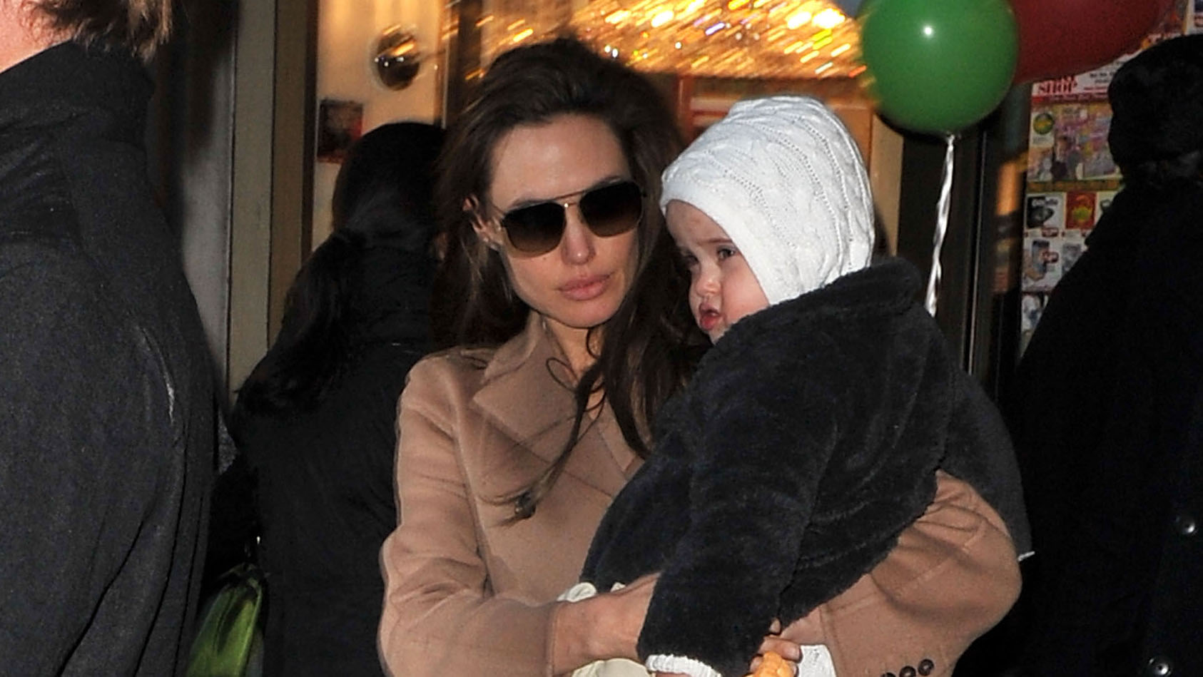 Angelina Jolie looks chic in a black shawl during shopping trip with  daughter Shiloh, 15