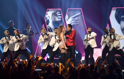 Jennifer Lopez and Smokey Robinson perform onstage during the 61st Annual GRAMMY Awards