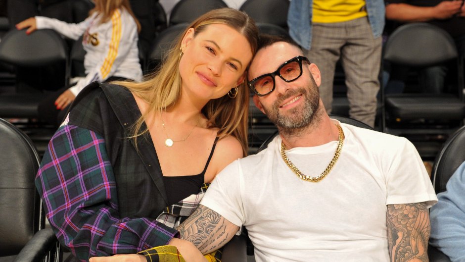 Adam Levine and Behati Prinsloo attend a basketball game between the Los Angeles Lakers and the Houston Rockets at Staples Center