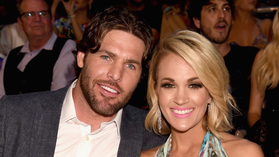 NHL player Mike Fisher (L) and musician Carrie Underwood attend the 2016 CMT Music awards