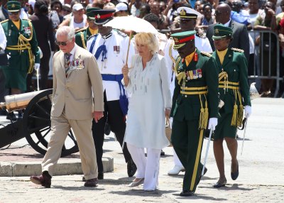 Prince Charles, Prince of Wales and Camilla, Duchess of Cornwall attend a parade and wreath laying ceremony at Hereos Square on March 19, 2019 in Bridgetown, Barbados