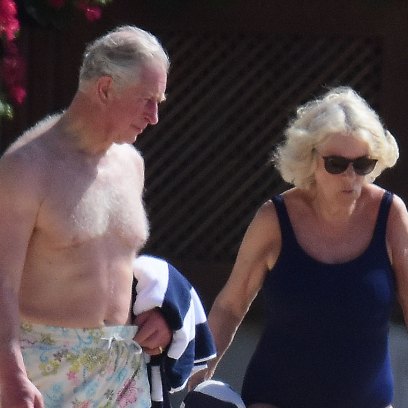 Prince Charles and wife Camilla, Duchess of Cornwall, pictured on the beach in Barbados. The Prince of Wales, 70, showed off his trim frame in floral trunks while Camilla, 71, wore an aqua-blue one-piece swimsuit. Camilla and Charles are touring the Caribbean representing the Queen at the behest of the Foreign Office.