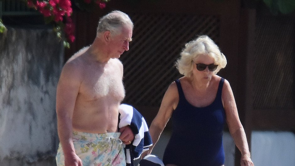 Prince Charles and wife Camilla, Duchess of Cornwall, pictured on the beach in Barbados. The Prince of Wales, 70, showed off his trim frame in floral trunks while Camilla, 71, wore an aqua-blue one-piece swimsuit. Camilla and Charles are touring the Caribbean representing the Queen at the behest of the Foreign Office.