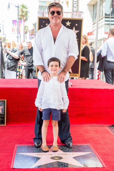 Simon Cowell and Eric Cowell attend a ceremony honoring Cowell with a star on the Hollywood Walk of Fame