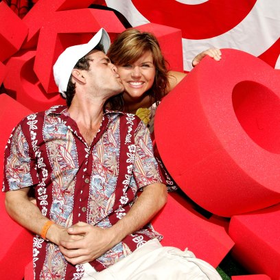 Actors Luke Perry and Tiffani Thiessen pose at the target crossword puzzle at the "Target A Time for Heroes to Benefit the Elizabeth Glaser Pediatric AIDS Foundation"