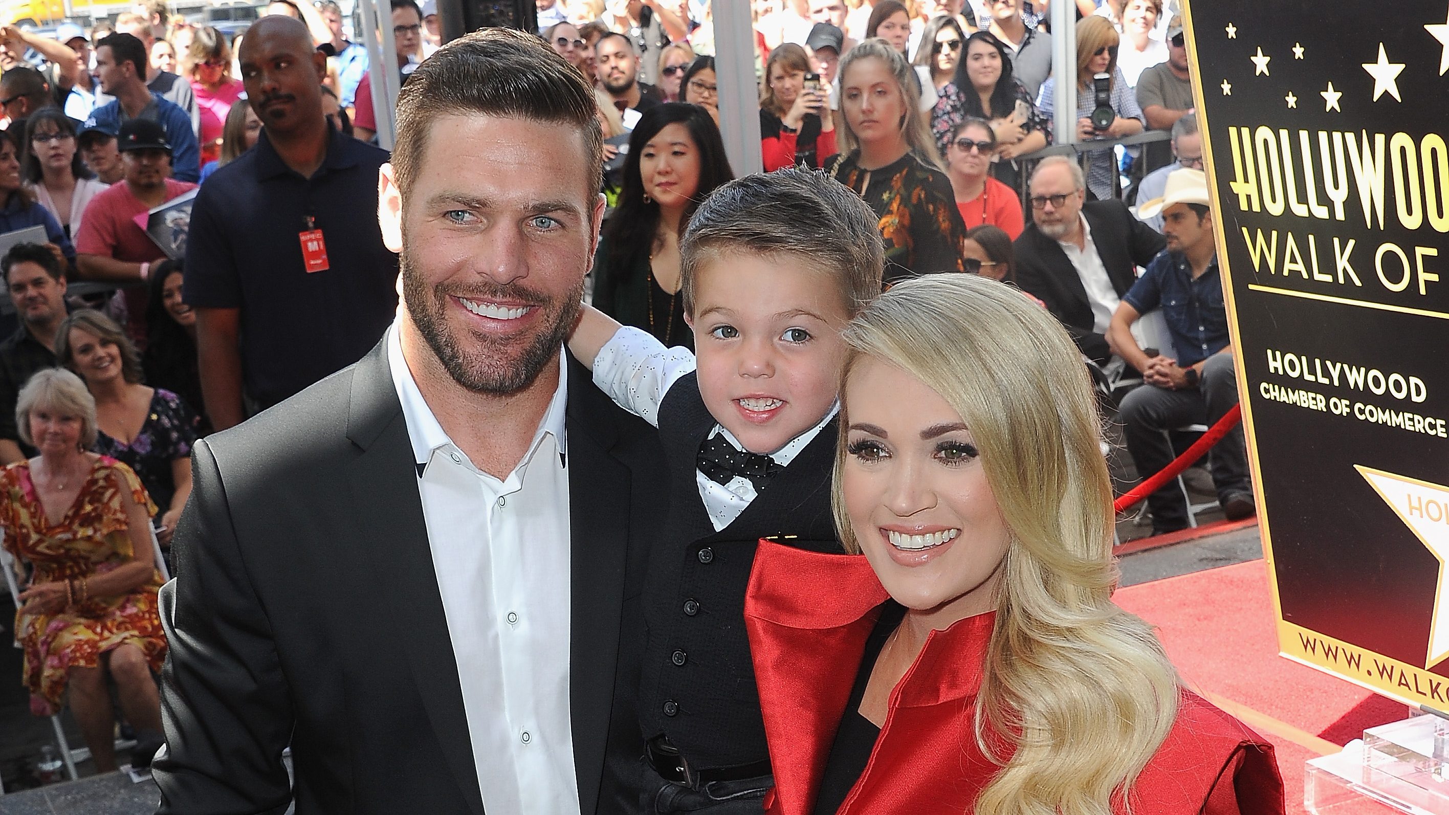 Carrie Underwood's Husband Mike Fisher and Son Isaiah Drop Puck at
