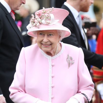 queen-elizbaeth-accepts-flowers-from-blogger-at-royal-garden-party-at-buckingham-palace