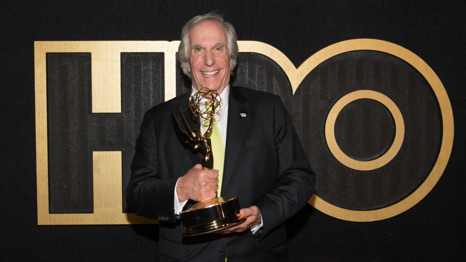Henry Winkler holding an Emmy after winning big at the 2018 Emmys