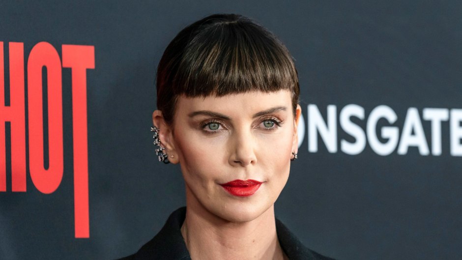 Charlize Theron Wearing a Black Blazer and a Red Lip on the Red Carpet Premiere for 'Long Shot'