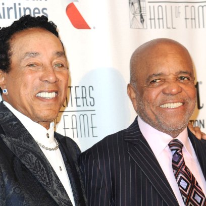 Smokey Robinson and Berry Gordy Jr. of Motown Wear Suits on a Red Carpet
