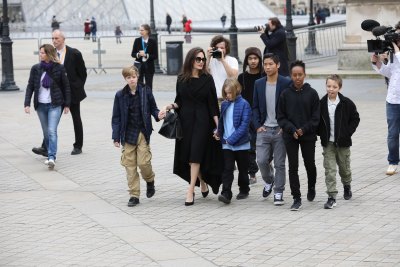 Angelina Jolie leaves the Louvre with her children