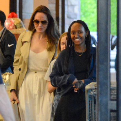 Angelina Jolie Goes Grocery Shopping With Daughters