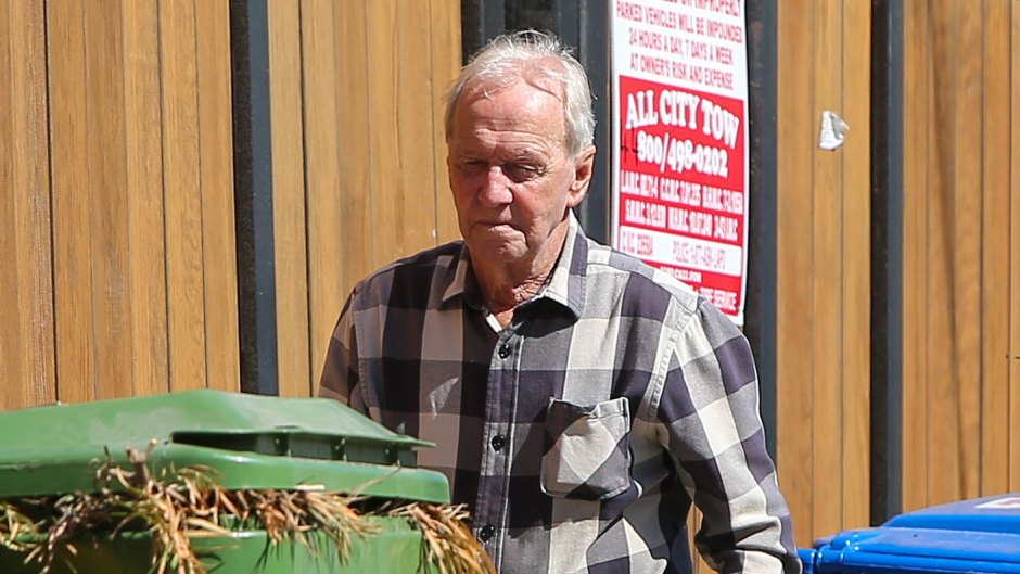 Paul Hogan is spotted wheeling out his trash bins on the morning of his 80th birthday [Tuesday October 8.]