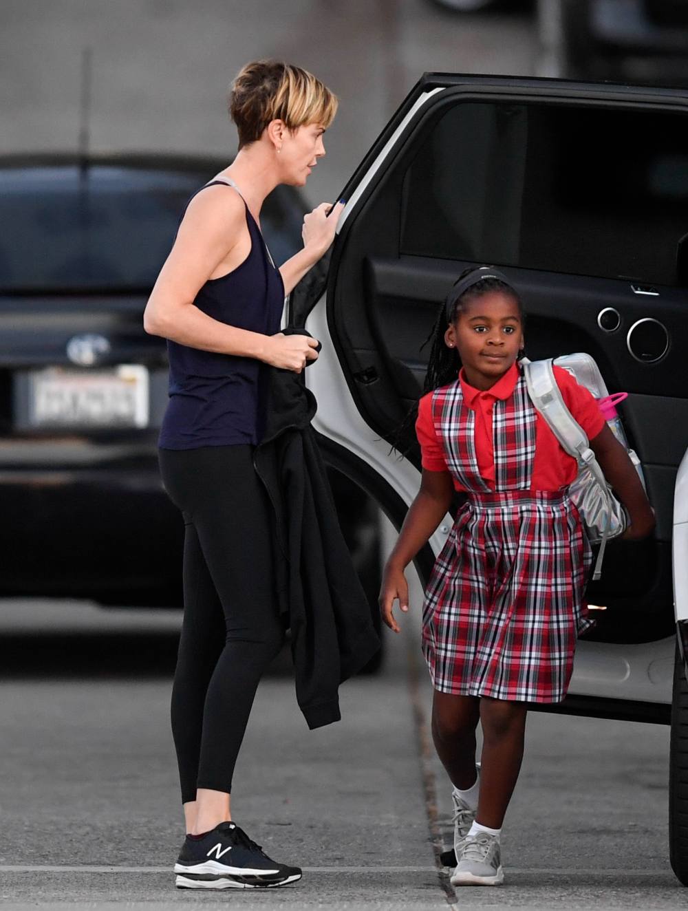 Child drags charlize theron The Fate