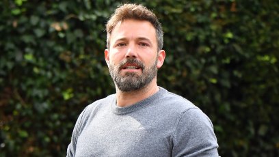 Ben Affleck Carrying an Iced Coffee While Wearing a Gray Shirt and Jeans