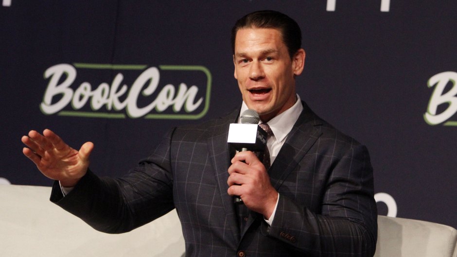 John Cena in a Suit and Holding a Microphone at BookCon 2019