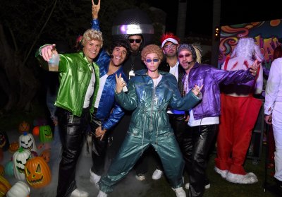 Justin Timberlake dressed up as a microphone and wife Jessica Biel dressed up at Justin Timberlake and the rest of their friends dressed up as other members of 'Nsync