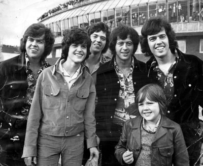 The Osmonds Pop Group Pictured At London Airport. Left To Right Are Merrill Donny Jay Wayne Alan And Jimmy.