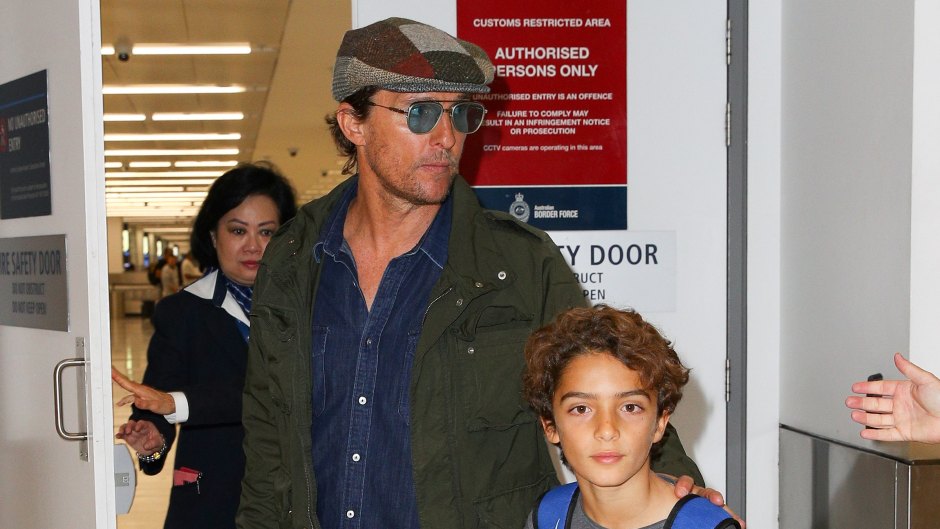 Matthew McConaughey pictured on arrival into Sydney with his son.