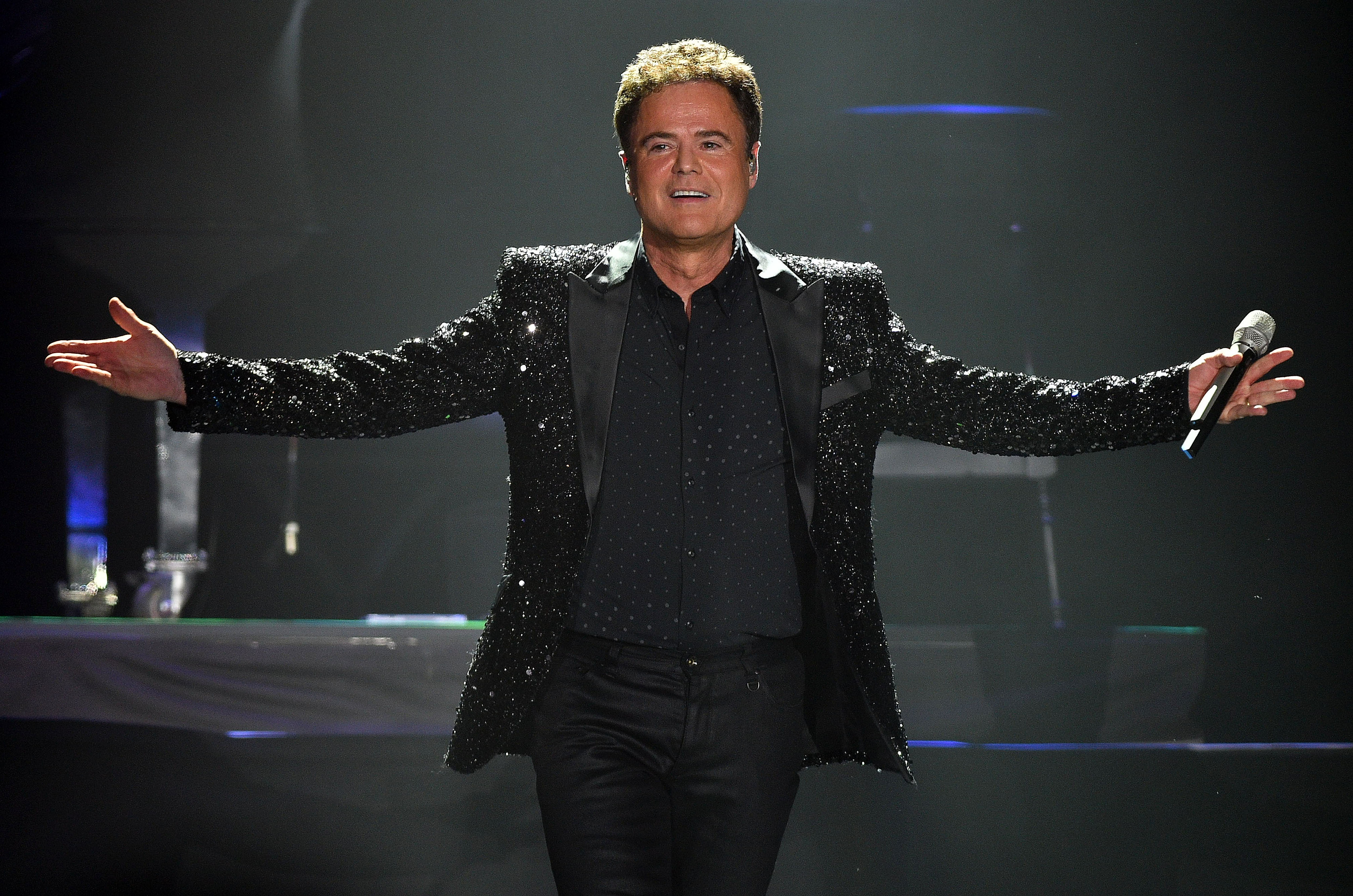 Donny Osmond Reunites With 'Dancing With the Stars' Trophy | Closer Weekly