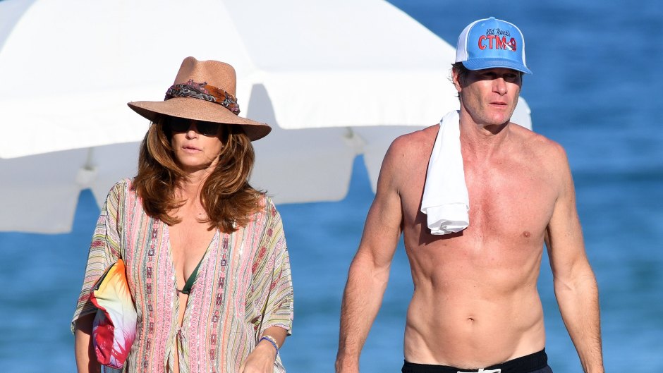 Cindy Crawford and Rande Gerber look relaxed as they hit the beach on New Year's Day in Miami