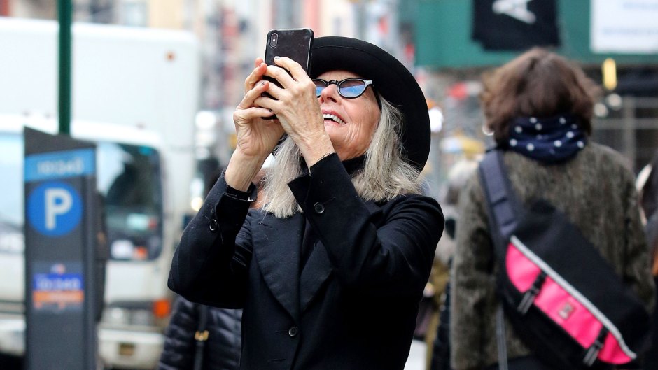 Diane Keaton is all smiles as she goes sightseeing while snapping pictures of graffiti and wall murals in NYC