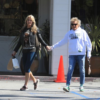 Rod Stewart, 75, wears protective gloves as he steps out for breakfast with Penny Lancaster, 49, amid coronavirus COVID-19 crisis