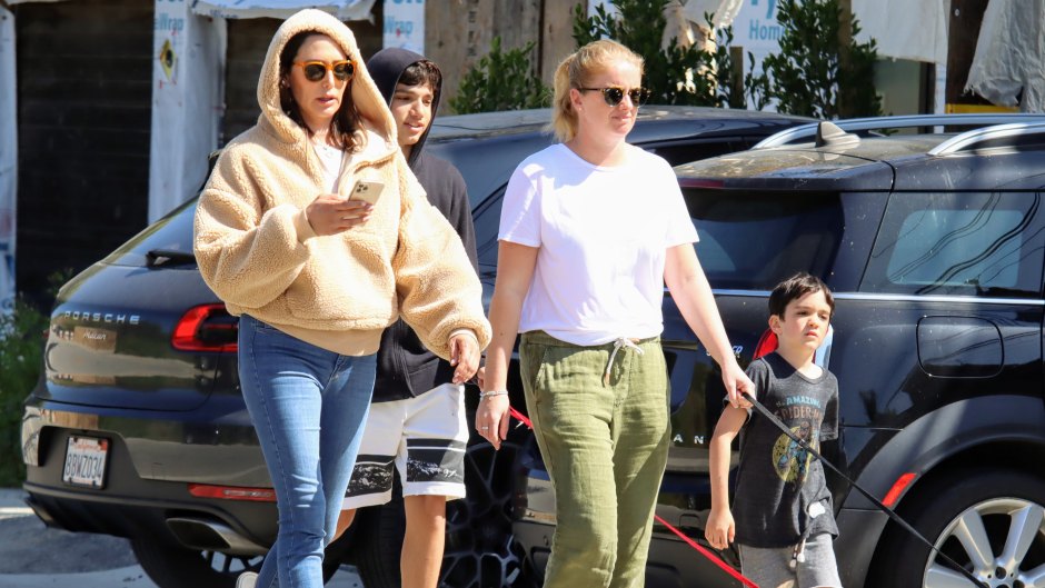 EXCLUSIVE: Simon Cowell's girlfriend Lauren Silverman takes their son Eric on dog walk with bodyguard for some fresh air