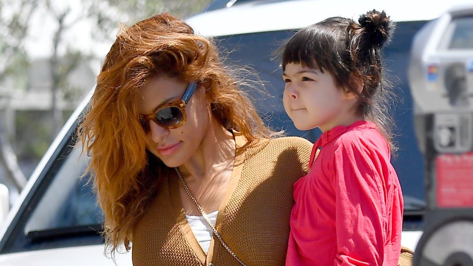 Eva Mendes has her hands full as she heads out to lunch with her two daughters