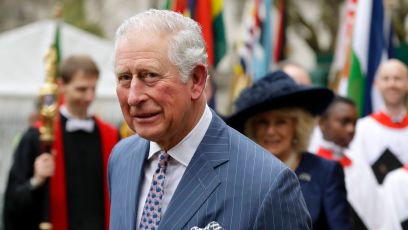 Prince Charles Looks Serious in Blue Suit and Polka Dot Tie