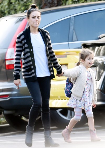 Mila Kunis and Wyatt hold hands running errands together