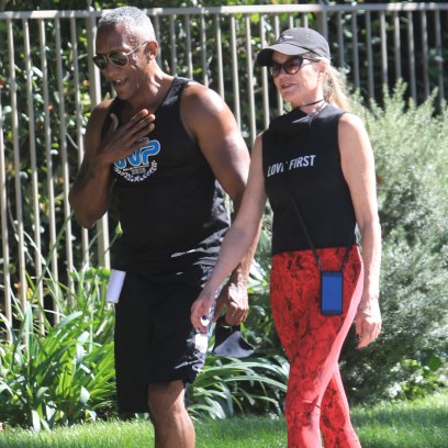 Melanie Griffith out jogging with a Male friend in Beverly Hills
