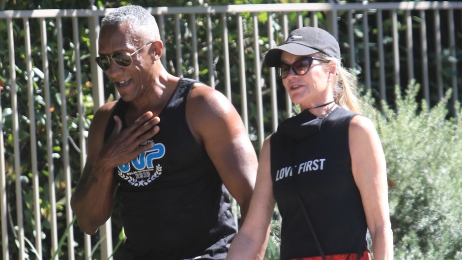 Melanie Griffith out jogging with a Male friend in Beverly Hills