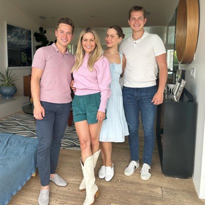 Candace Cameron Bure with sons and daughter in living room