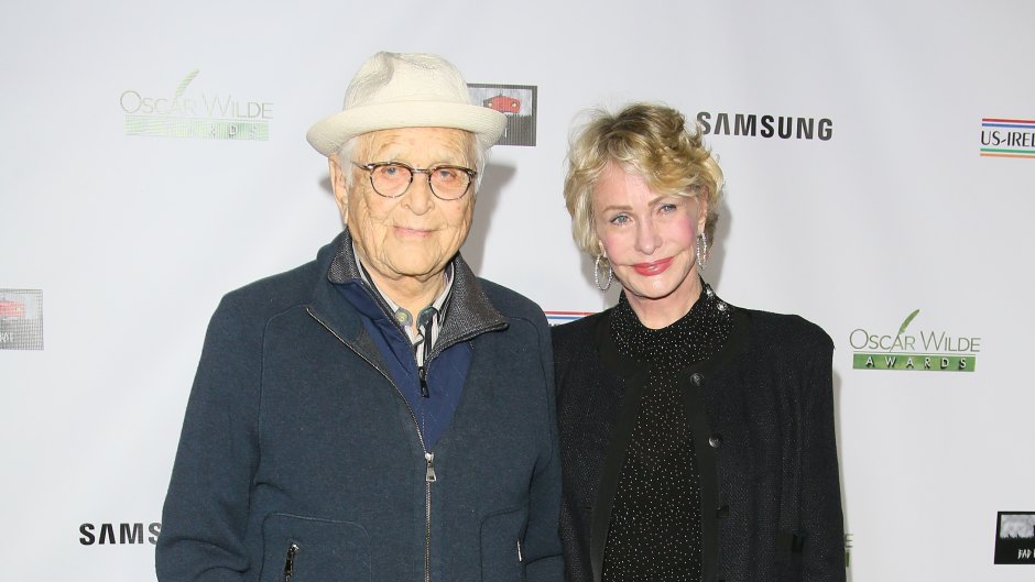 Norman Lear walks with cane in red carpet appearance with wife