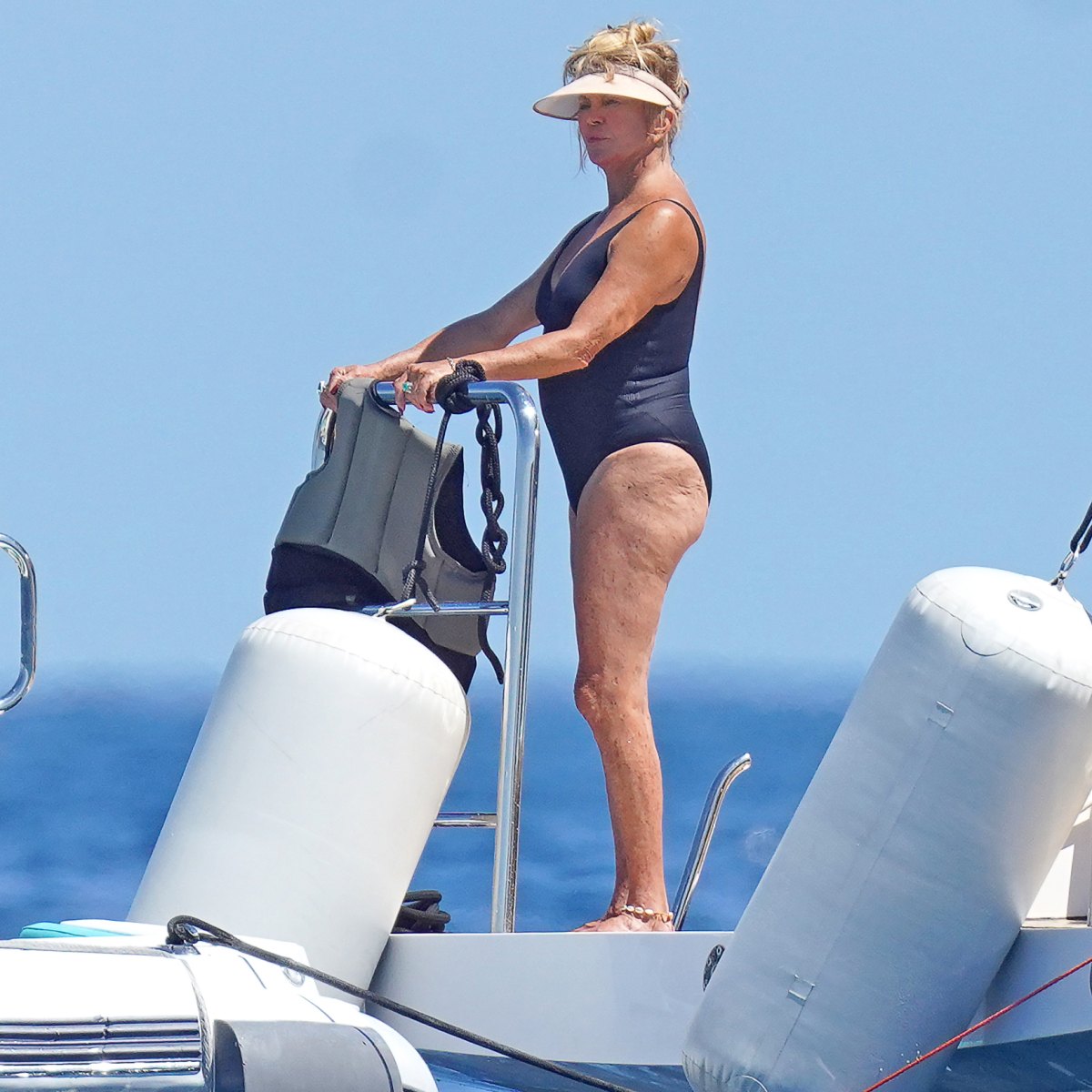 Goldie Hawn, 70, flaunts enviable figure in plunging gold swimsuit