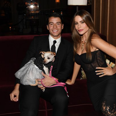 Sofia Vergara sits on couch with son Manolo Gonzalez and his dog
