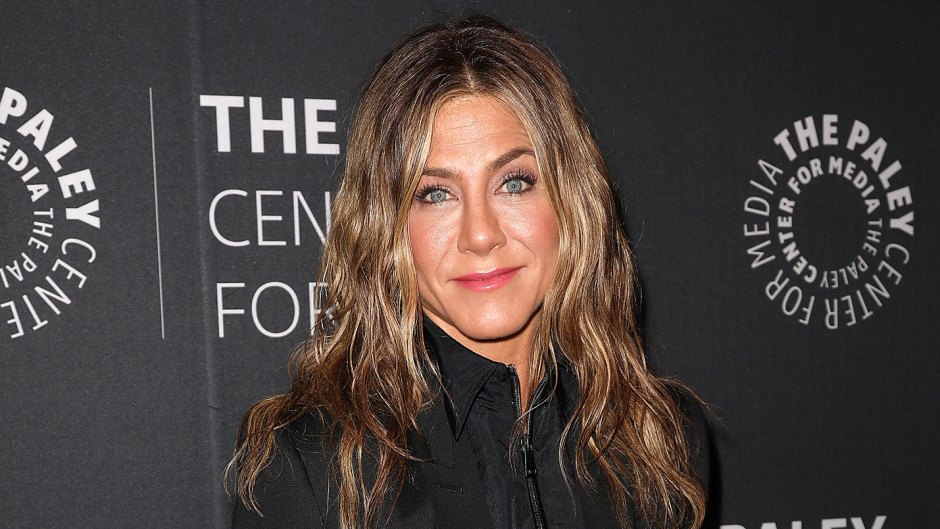 Jennifer Aniston Flaunts Gorgeous Legs as She Relaxes in Short Bathrobe at Home With Pup Chesterfield