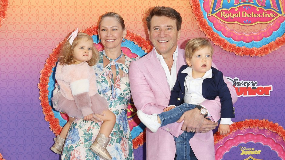 Robert Herjavec and wife Kym Johnson hold kids Hudson and Haven