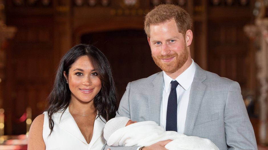 Prince Harry and Meghan Markle posing with son Archie