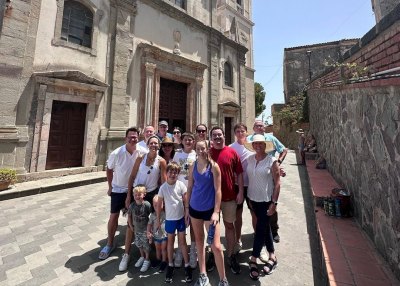Dylan Dreyer and Brian Fichera pose with their family in Italy