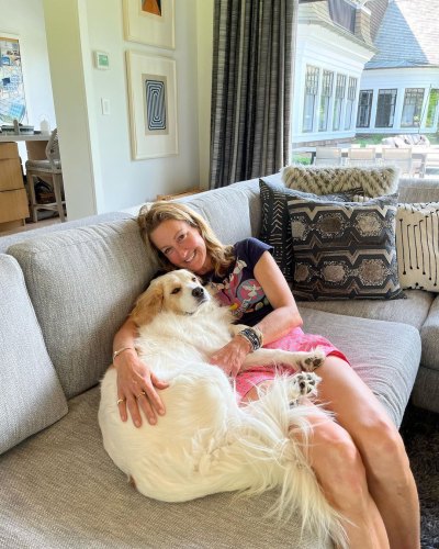 Lara Spencer lays with dog on sofa of Connecticut home