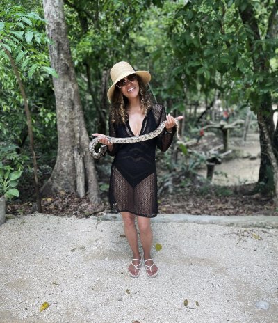 Halle Berry Poses in Swimsuit While Holding a Snake