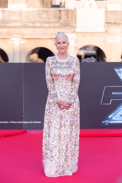 Helen Mirren wears white sequined gown with long sleeves 